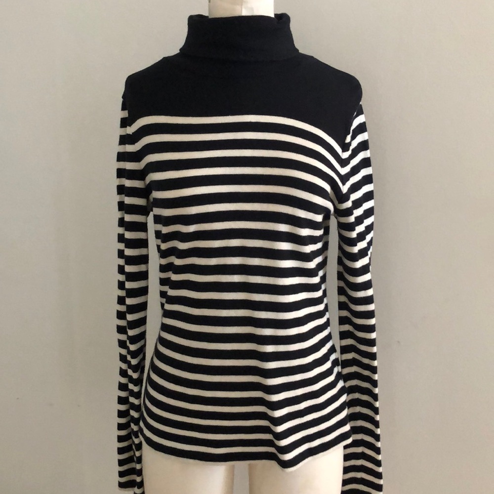 Black and white striped turtleneck.